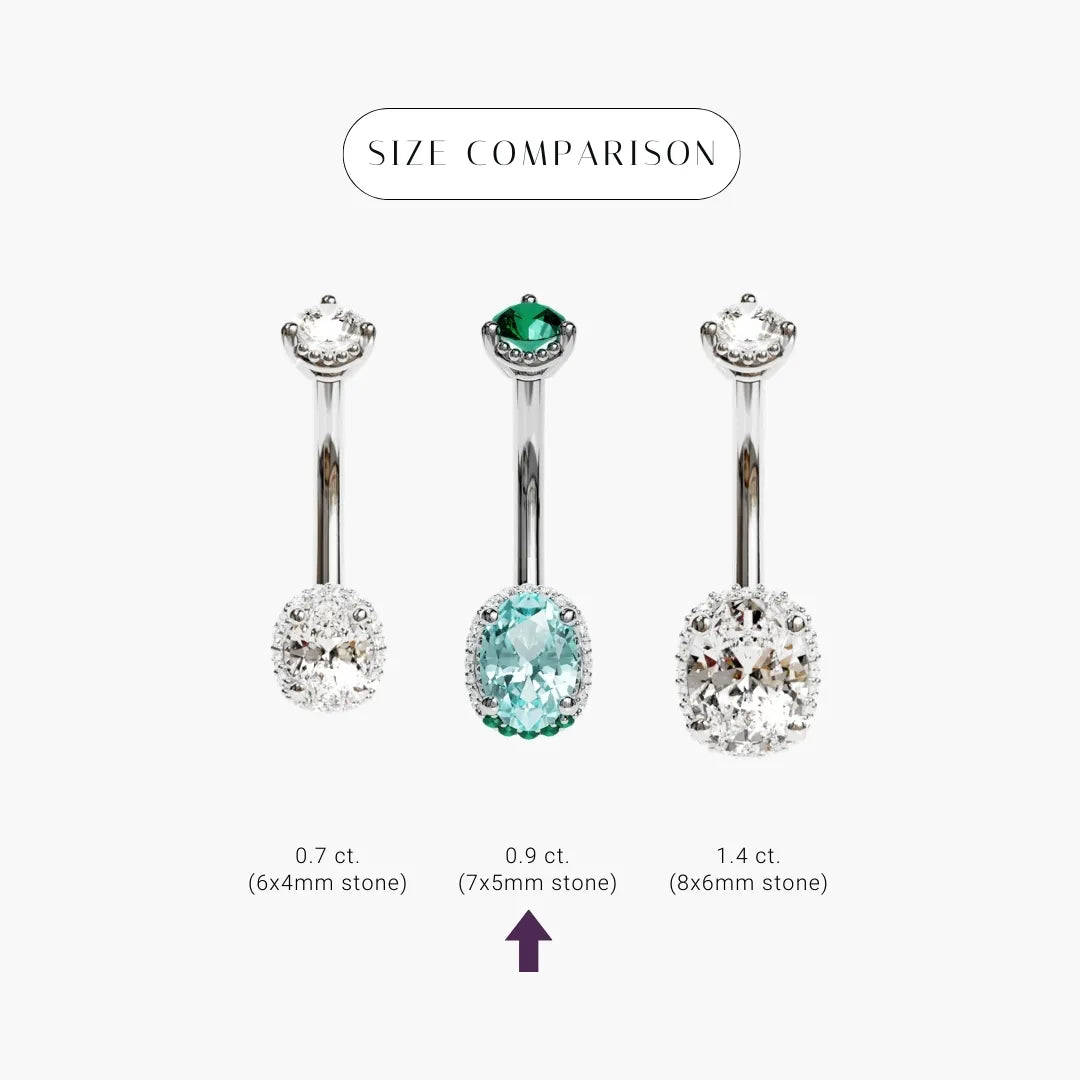 La Femme Azure size comparison in white gold, the aqua blue 0.9 ct oval set among clear lab diamond ovals