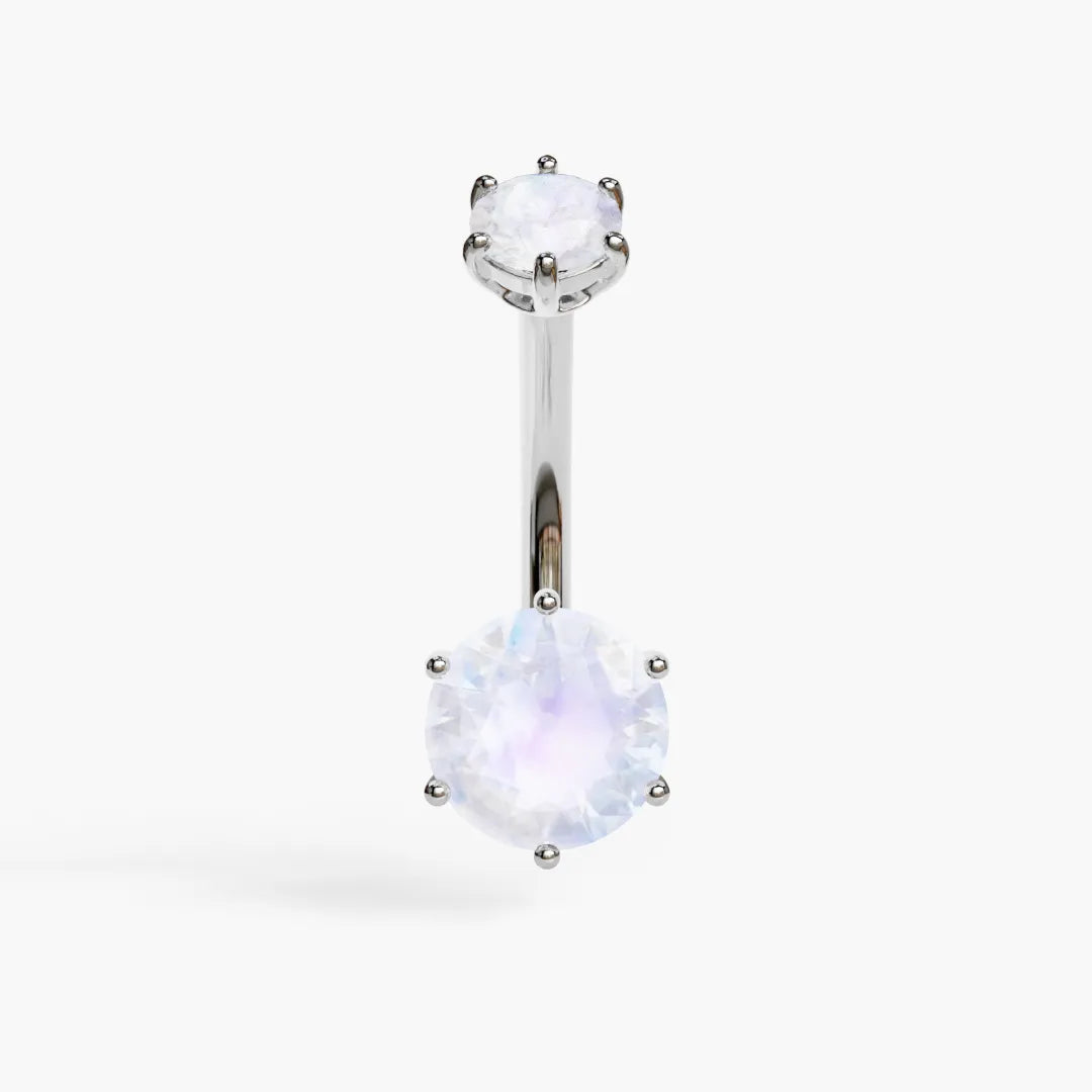 Jolie Co Orb 7mm Moonstone everyday belly ring in white gold: a milky 7mm round moonstone in six prongs below a matching 4mm top