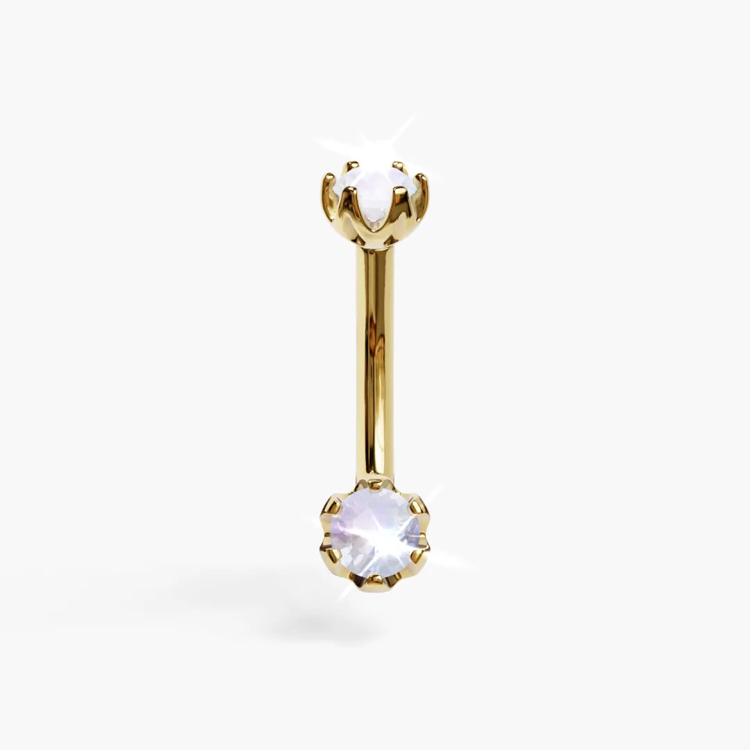 Jolie Co Orchid 4mm Moonstone dainty belly ring in yellow gold: a milky 4mm round moonstone in orchid-petal prongs below a 4mm top