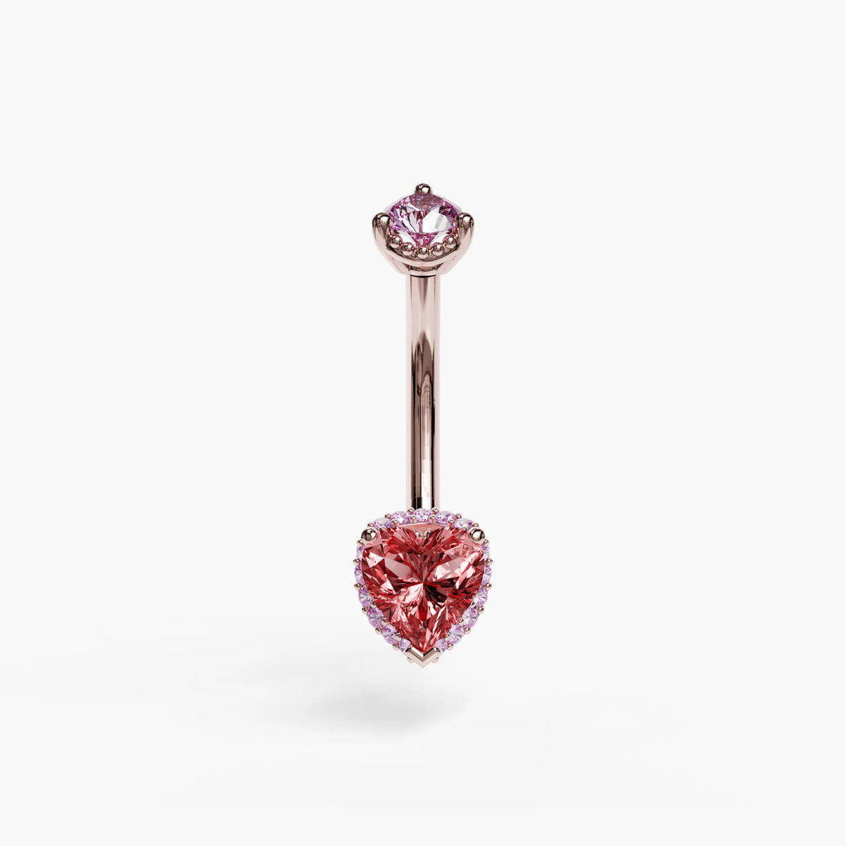 La Femme Heart Blush belly ring in 14k rose gold, rose on rose with a red lab sapphire heart