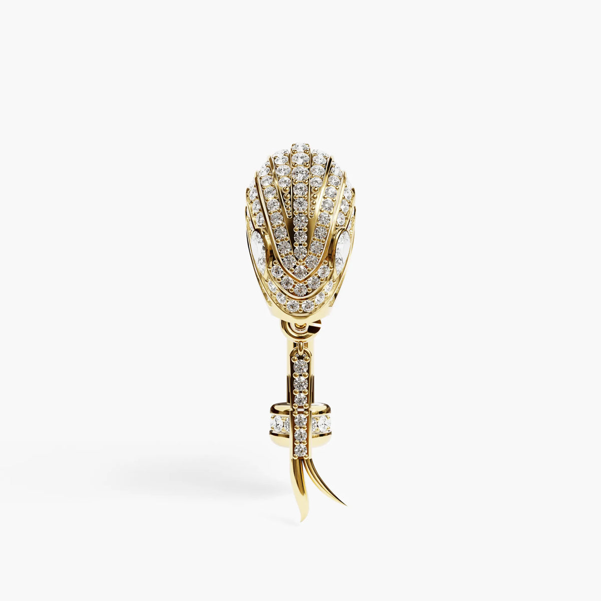 The Lure belly ring in 18k yellow gold, tail wrapped along the bar