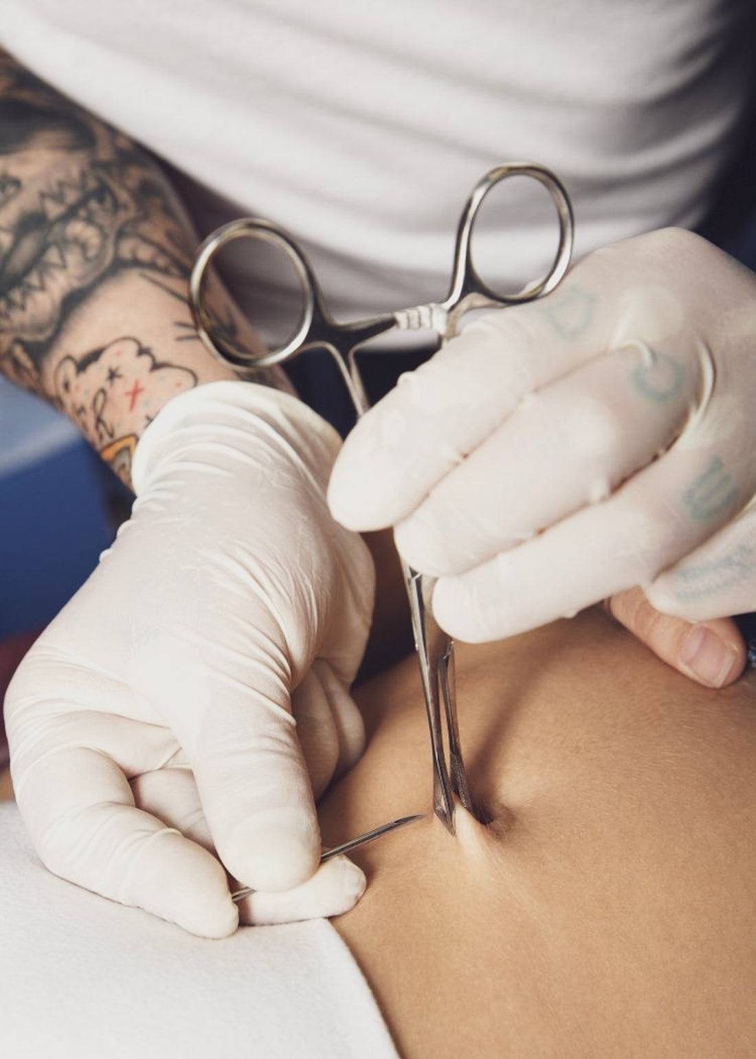 What to consider before getting a belly button piercing.